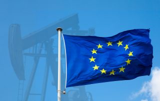 EU flag in front of oil rig