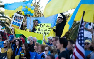 Los Angeles, California, USA 2022: Stand with Ukraine. Protest against the war and russian armed aggressive Vladimir Putin politic. Americans in defense of Ukraine.