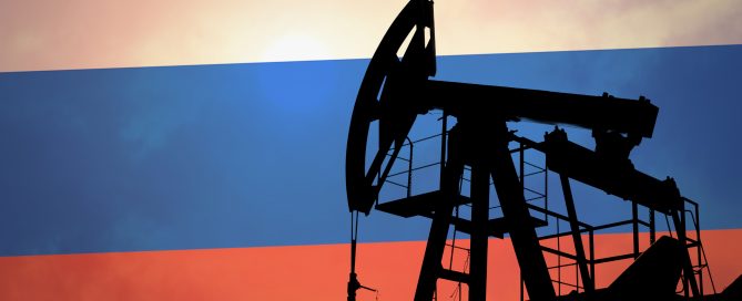 Oil pump on background of flag of Russia