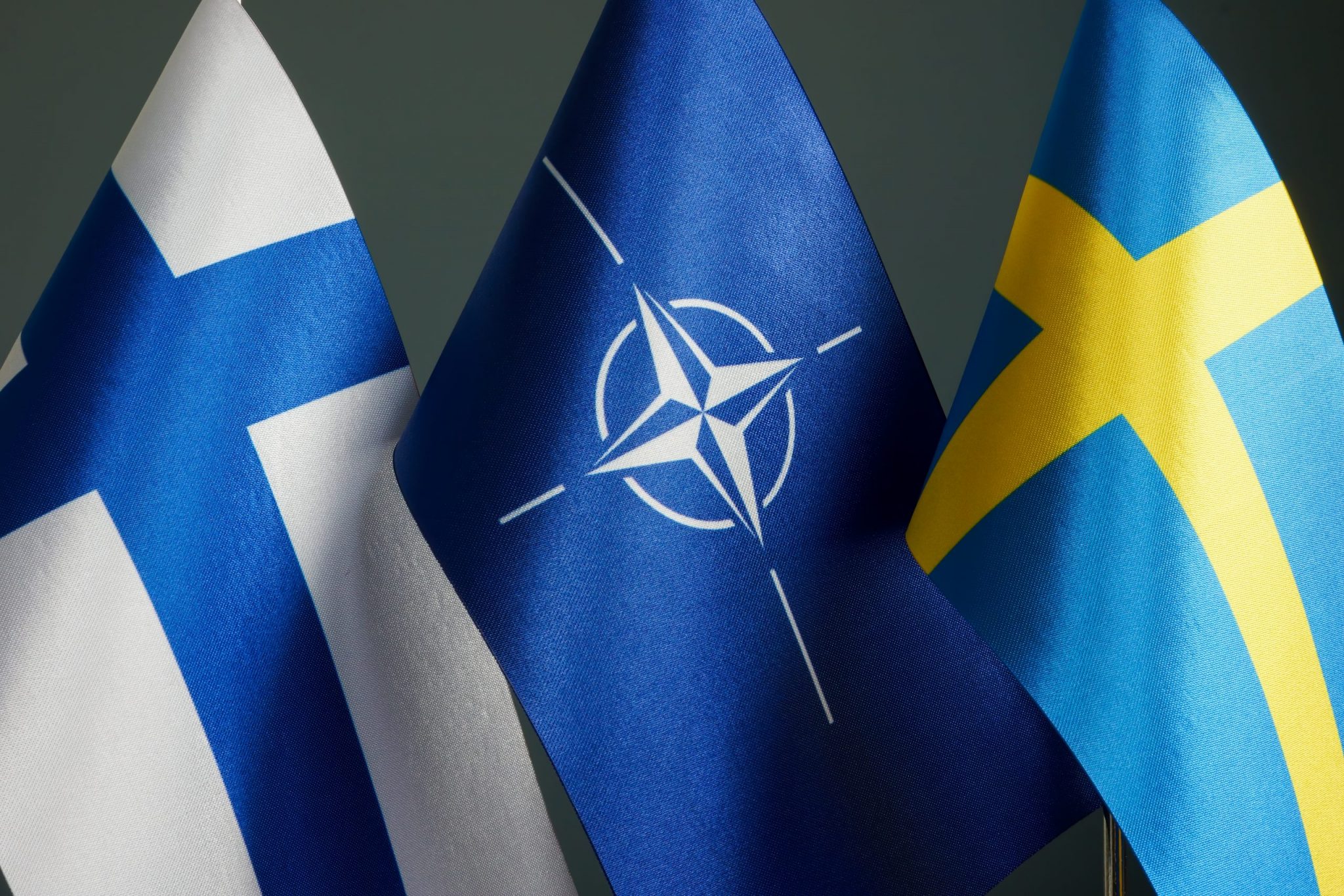 Flags of Sweden, Finland and NATO.