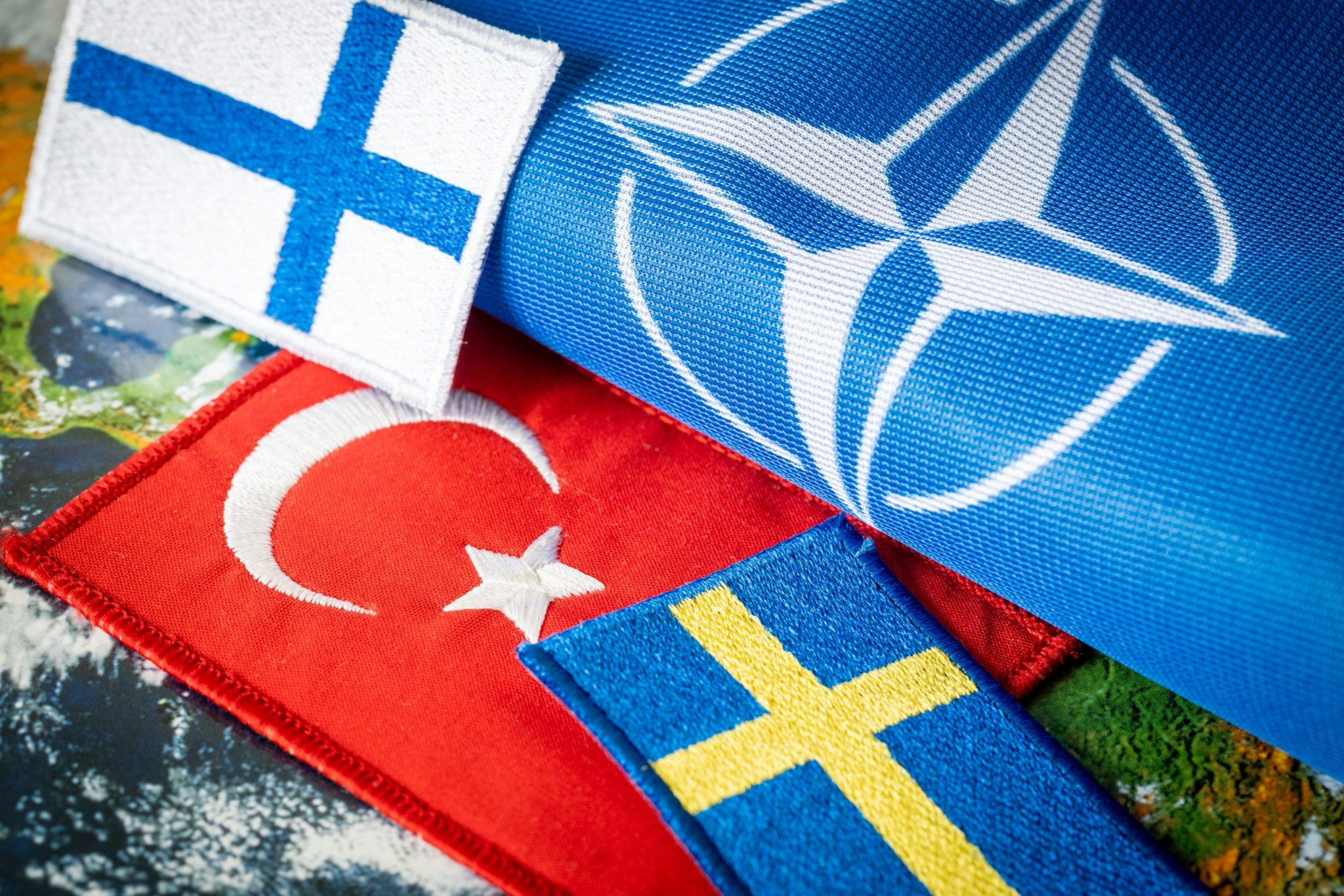 15, May, 2022, Turkish flag next to the flags of Finland and Sweden Concept of a political conflict between a member of the North Atlantic Pact and candidates aspiring to join NATO