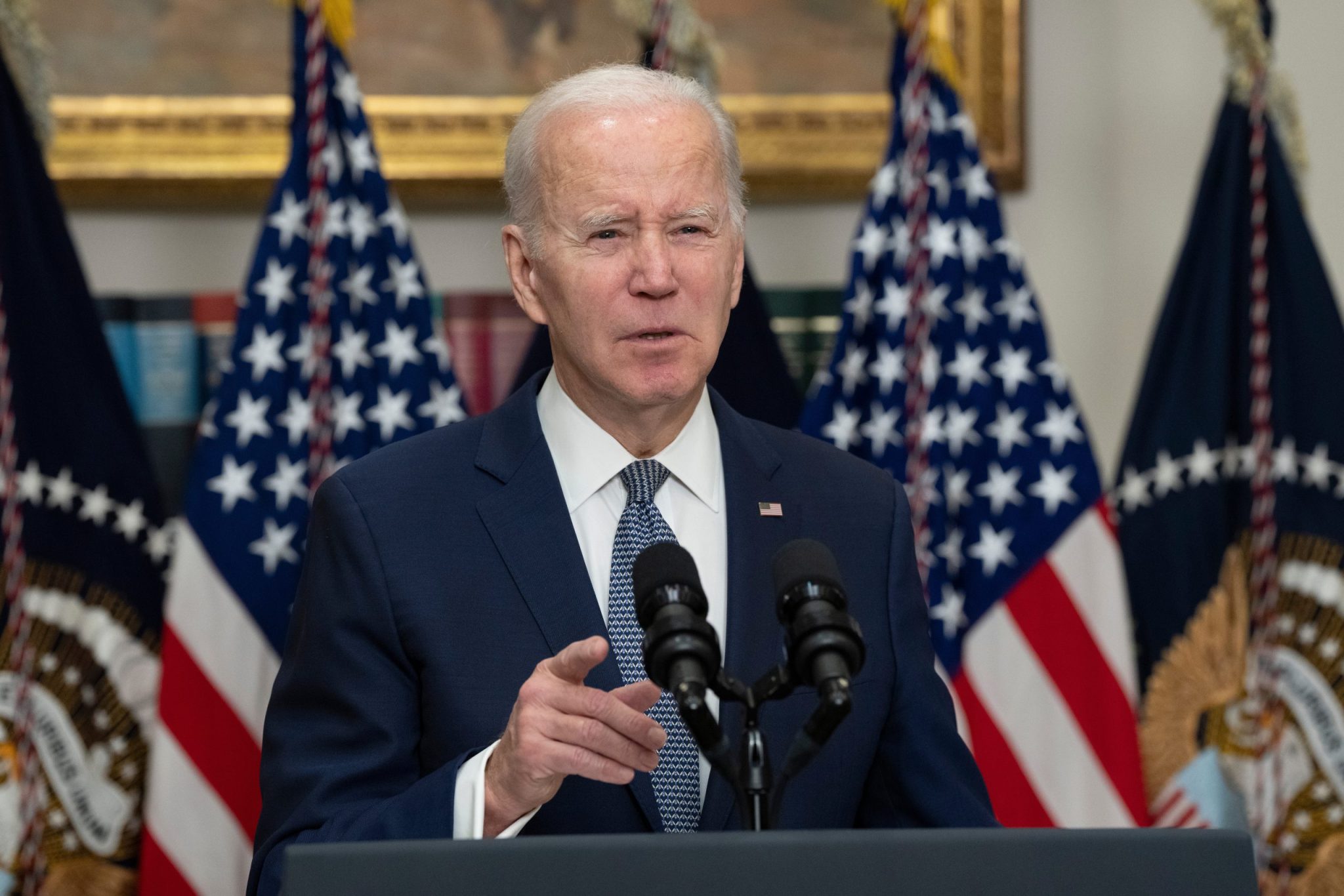Washington, DC US - Mar 13, 2023: US President Joe Biden speaking in front of American flag