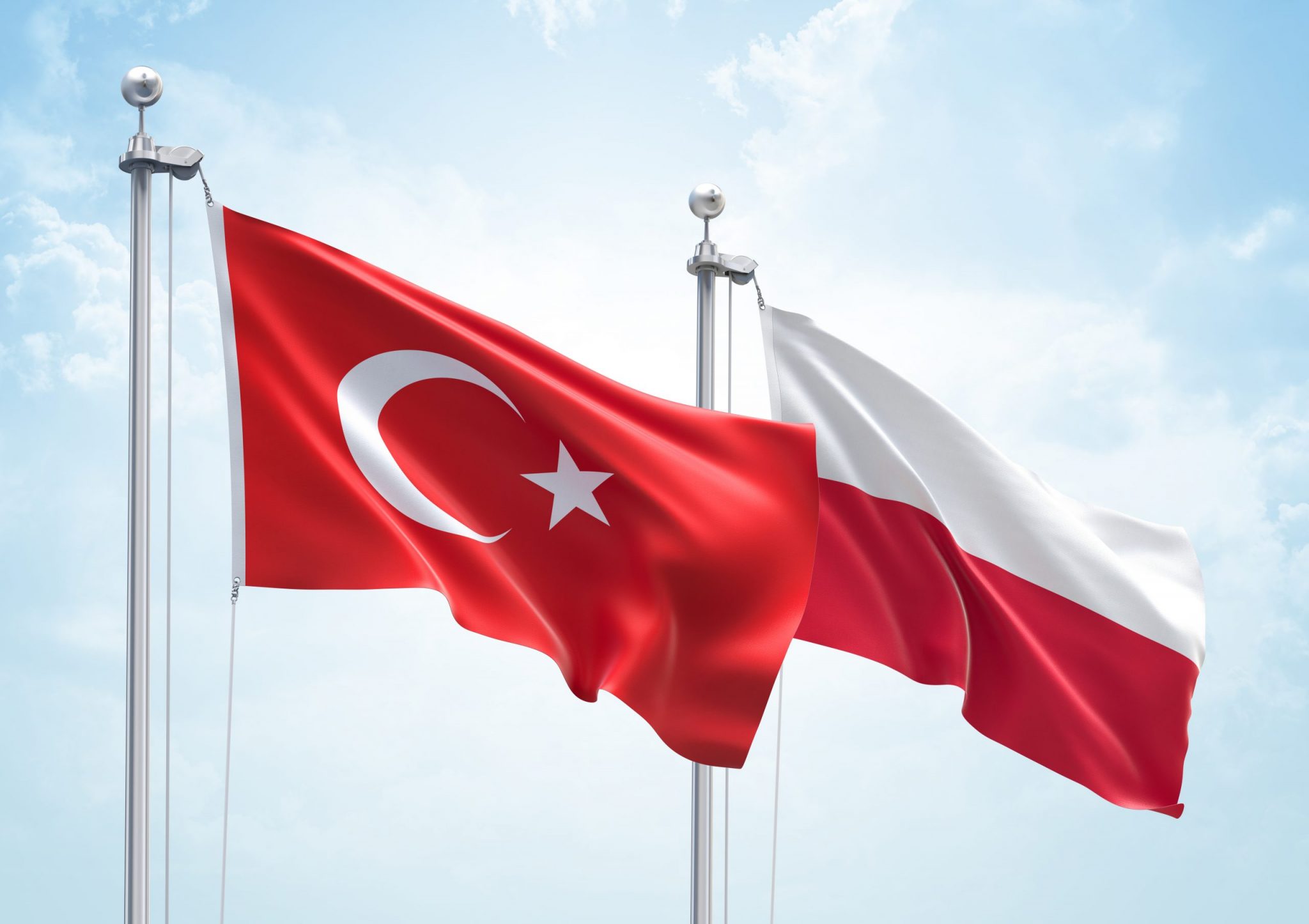 3D Rendering of Turkey & Poland Flags are Waving in the Sky