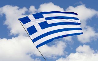 Greece flag isolated on sky background with clipping path