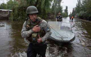 KHERSON, UKRAINE - Jun. 12, 2023: Volunteers actively helping to rescue local residents