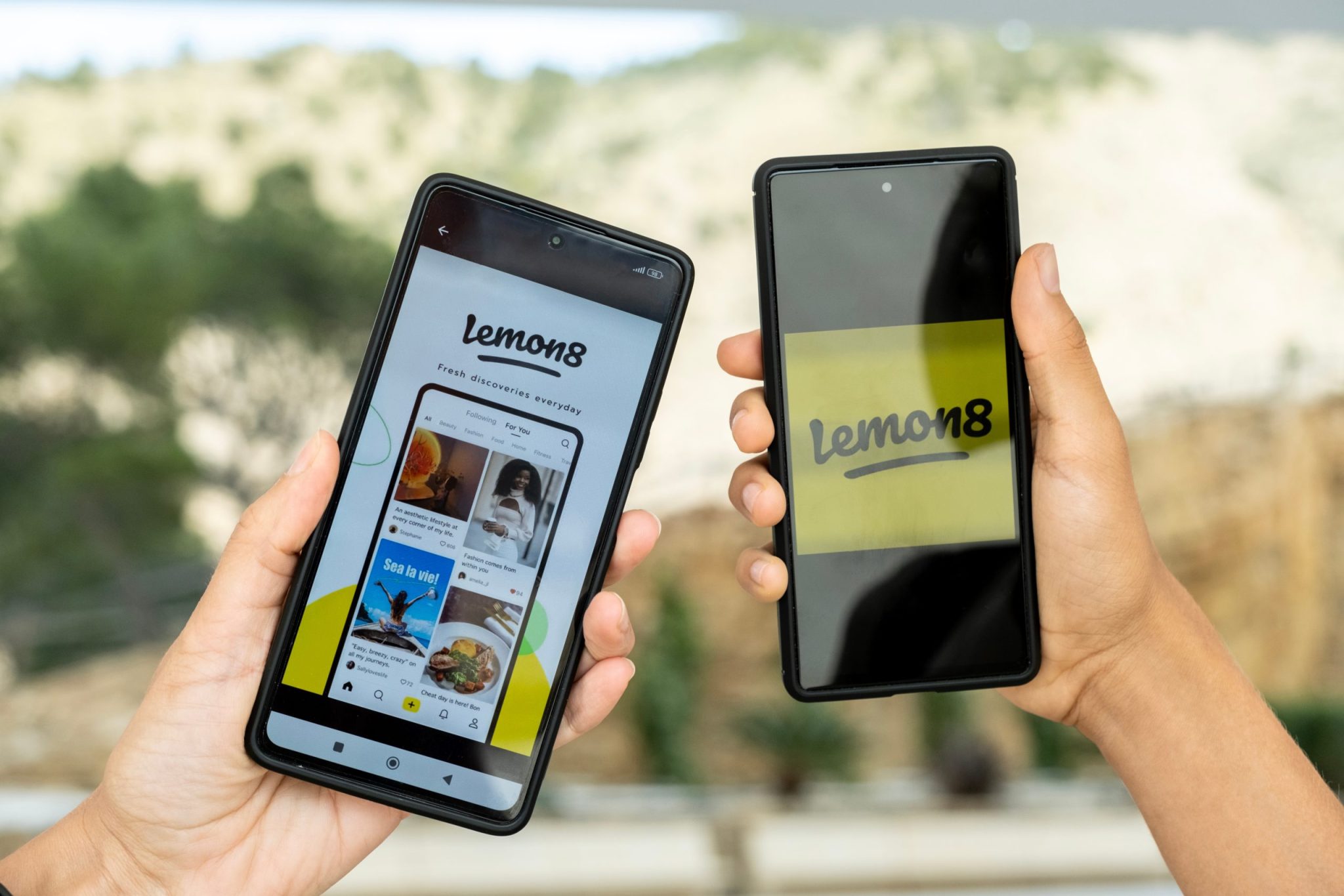 Two smartphones with content sharing platform Lemon8 app on the screen.
